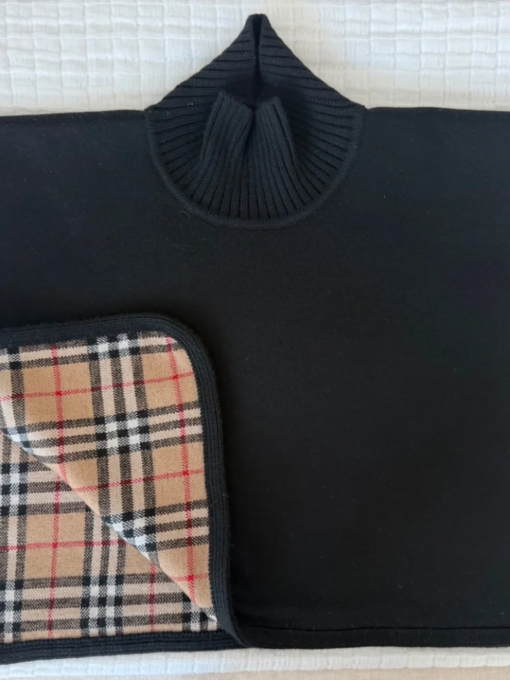 Reversible Burberry coat.
